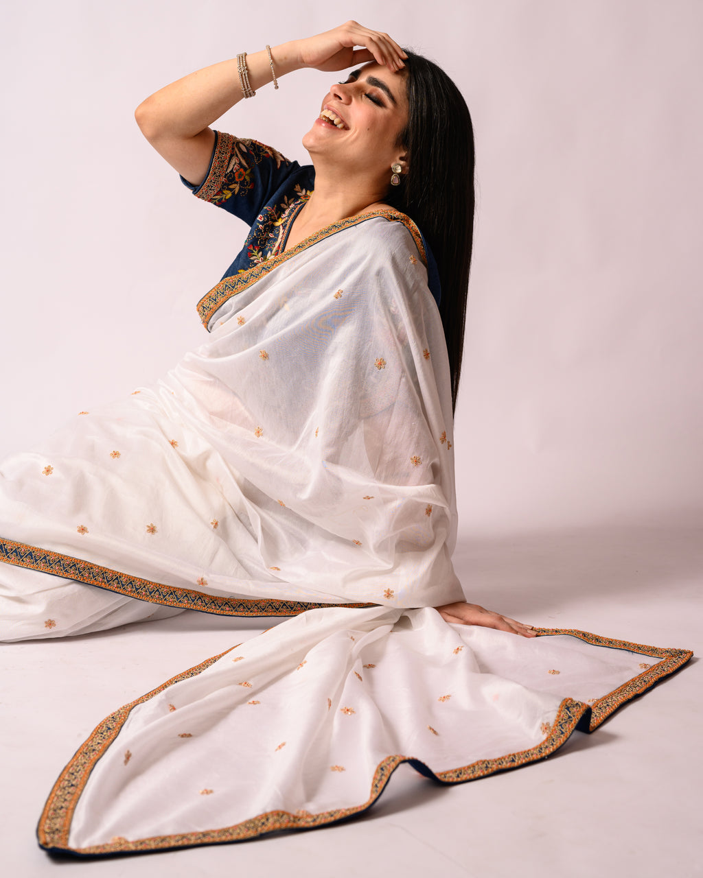 White Saree with Lace and Denim Blouse